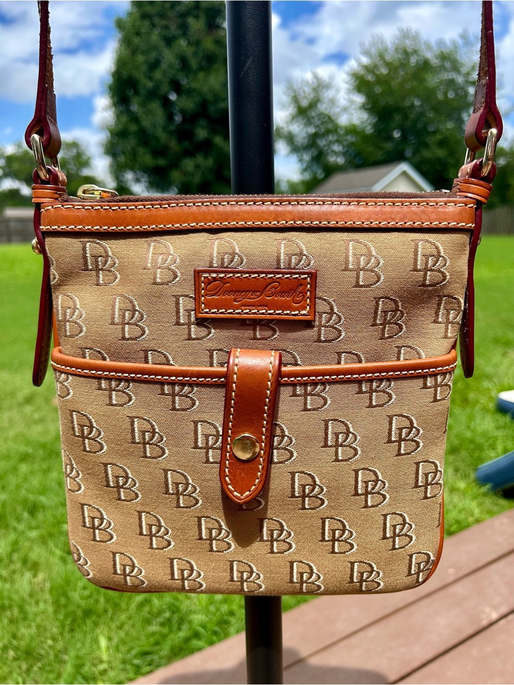 Dooney & Bourke Brown Signature Jacquard Letter Carrier Crossbody Bag